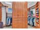Large walk-in closet with ample shelving and hanging space at 4907 Londonderry Dr, Tampa, FL 33647