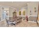 Bright dining room features a large table and hardwood floors at 4907 Londonderry Dr, Tampa, FL 33647