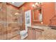 Bathroom with terracotta tile and a walk-in shower at 4907 Londonderry Dr, Tampa, FL 33647