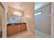 Bathroom with double vanity and walk-in shower at 5721 Sunset Falls Dr, Apollo Beach, FL 33572