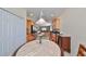 Cozy dining area with a view of the kitchen with ample cabinet space at 5721 Sunset Falls Dr, Apollo Beach, FL 33572