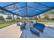 Community outdoor lounge area featuring blue cushioned furniture under a shaded pavilion at 5721 Sunset Falls Dr, Apollo Beach, FL 33572