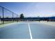 Well-maintained tennis court, offering an excellent space for recreational activities within the community at 5721 Sunset Falls Dr, Apollo Beach, FL 33572