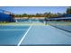 Well-maintained tennis courts perfect for players of all skill levels, offering a great recreational activity at 5721 Sunset Falls Dr, Apollo Beach, FL 33572