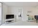 Living room with view into bedroom and water views at 7625 Sun Island S Dr # 305, South Pasadena, FL 33707