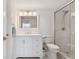 Clean bathroom with a large shower and updated white vanity at 7625 Sun Island S Dr # 305, South Pasadena, FL 33707