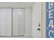 Entryway with white louvered doors and beach decor at 7625 Sun Island S Dr # 305, South Pasadena, FL 33707