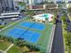 Two well-maintained tennis courts at 7625 Sun Island S Dr # 305, South Pasadena, FL 33707