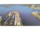 Aerial view of a condo building and surrounding parking at 7625 Sun Island S Dr # 305, South Pasadena, FL 33707