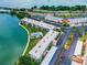 Waterfront condo building with pool and parking; aerial view at 7625 Sun Island S Dr # 305, South Pasadena, FL 33707
