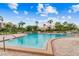 Relaxing community pool with patio furniture at 7625 Sun Island S Dr # 305, South Pasadena, FL 33707