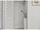 Compact laundry room with stackable washer and dryer at 7625 Sun Island S Dr # 305, South Pasadena, FL 33707