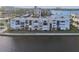 Aerial view of a waterfront condominium building at 7625 Sun Island S Dr # 305, South Pasadena, FL 33707