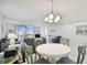 Condo dining area with view of living room and water at 7625 Sun Island S Dr # 305, South Pasadena, FL 33707