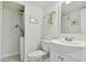 Small bathroom with toilet, vanity, and stackable washer/dryer at 7625 Sun Island S Dr # 305, South Pasadena, FL 33707