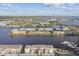Aerial view showcasing waterfront property and surrounding landscape at 7625 Sun Island S Dr # 305, South Pasadena, FL 33707