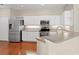 Modern kitchen with stainless steel appliances and white cabinets at 8604 Egret Point Ct, Tampa, FL 33647