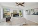 Bedroom with backyard view and ceiling fan at 8910 Beeler Dr, Tampa, FL 33626