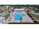 Community pool with ample deck space for lounging at 150 Boca Ciega Point S Blvd # 3, St Petersburg, FL 33708