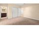 Bright bedroom with double doors and carpet flooring at 562 Rivercrest Ln, Tarpon Springs, FL 34689