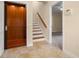 Home interior showing elevator and staircase at 562 Rivercrest Ln, Tarpon Springs, FL 34689