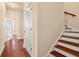 Hallway with wood flooring and access to bedrooms at 562 Rivercrest Ln, Tarpon Springs, FL 34689
