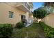 Private patio with grill and seating area, perfect for outdoor entertaining at 562 Rivercrest Ln, Tarpon Springs, FL 34689