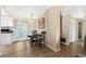 Cozy dining area with round table and chairs near kitchen at 9085 Leisure N Ln, Largo, FL 33773