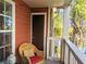 Balcony with wicker chair and lake view at 10200 Gandy N Blvd # 921, St Petersburg, FL 33702