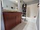 Updated bathroom with granite vanity and a shower/tub combo at 10200 Gandy N Blvd # 921, St Petersburg, FL 33702