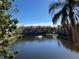 Tranquil lakefront view of the apartment community at 10200 Gandy N Blvd # 921, St Petersburg, FL 33702