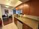 Kitchen featuring granite countertops and ample cabinetry at 10200 Gandy N Blvd # 921, St Petersburg, FL 33702
