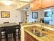 Kitchen with granite countertops, stainless steel appliances, and a double sink at 10200 Gandy N Blvd # 921, St Petersburg, FL 33702