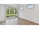 Bright room with sliding glass doors offering views of the outdoor area at 11517 Waterway Dr, Parrish, FL 34219