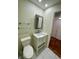 Updated bathroom with a vanity, toilet and shower at 2671 Sabal Springs Cir # 102, Clearwater, FL 33761