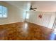 Bedroom with tile flooring, ceiling fan, and large closet at 2671 Sabal Springs Cir # 102, Clearwater, FL 33761