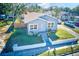 Newly renovated light blue house with a small front yard at 2905 E 21St Ave, Tampa, FL 33605