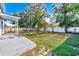 Large backyard with a spacious patio and playset at 2905 E 21St Ave, Tampa, FL 33605