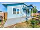 House's backyard view with a patio and fenced area at 2905 E 21St Ave, Tampa, FL 33605