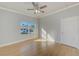 Bright bedroom with ceiling fan and hardwood floors at 2905 E 21St Ave, Tampa, FL 33605