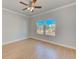Spacious bedroom with hardwood floors and ceiling fan at 2905 E 21St Ave, Tampa, FL 33605