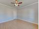 Large bedroom with hardwood floors and ceiling fan at 2905 E 21St Ave, Tampa, FL 33605
