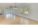 Open concept dining area with hardwood floors and chandelier at 2905 E 21St Ave, Tampa, FL 33605