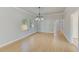 Spacious dining area with hardwood floors and modern chandelier at 2905 E 21St Ave, Tampa, FL 33605