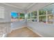 Bright kitchen nook with multiple windows and backyard views at 2905 E 21St Ave, Tampa, FL 33605