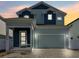 Two-story house with a two-car garage and landscaping at 3829 71St N St, St Petersburg, FL 33709
