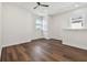 Spacious bedroom with dark wood floors and large windows at 3829 71St N St, St Petersburg, FL 33709