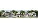 Row of new construction homes with driveways at 3829 71St N St, St Petersburg, FL 33709