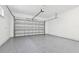 Spacious garage with epoxy flooring and an automatic garage door at 3829 71St N St, St Petersburg, FL 33709