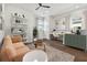 Home office with a desk, couch, and built-in shelves at 3829 71St N St, St Petersburg, FL 33709